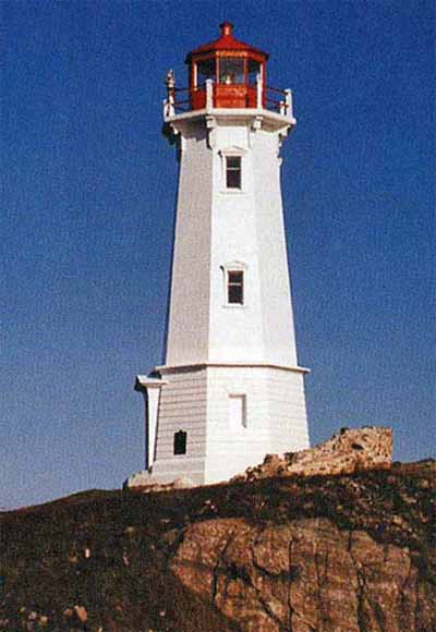 Side view of the Louisboug Lighttower showing its pedimented windows. © Lighthouses and Lights of Nova Scotia,  R. Erwin, n.d.
