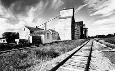 General view of the Inglis elevators, ca.1996. © Heritage Recording and Technical Data Services, HCP, RPS, ''Preliminary Record of 5 Grain Elevators, Inglis, Manitoba'', September/October 1996, photo 07526/23.