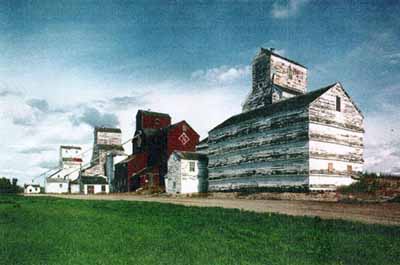 General view of the Inglis elevators, ca. 1996. © Heritage Recording and Technical Data Services, Heritage Conservation Program, RPS, ''Designated Building Heritage Recording Report: Preliminary Record of 5 Grain Elevators, Inglis, Manitoba'', September/October 1996.