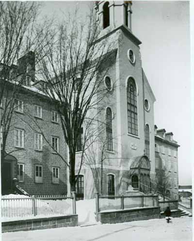 Corner view of the Bon-Pasteur Chapel, showing the Bon-Pasteur wing on the left and the Marie-Fitzbach wing on right, as seen ca. 1880. © Library and Archives Canada/ Bibliothèque et Archives Canada, PA 23915, ca. 1880.