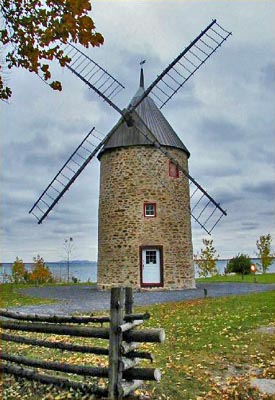 General view of the three-and-a-half storey mill at Île Perrot Windmill and Miller's House National Historic Sites of Canada, 2004. © Parks Canada Agency / Agence Parcs Canada, 2004.