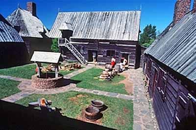 General view of the Port-Royal demonstrating the grouping of structures around an inner courtyard within the stockade, 1990. © Parks Canada Agercy/ Agence Parcs Canada, B. Pratt