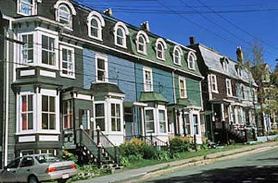 General view of Rennie's Mill Road Historic District showing the mixture of single and double houses and the predominance of wooden architecture, 2002. © Parks Canada Agency / Agence Parcs Canada, J.F. Bergeron, 2002.