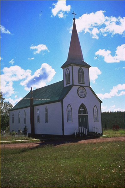 General view of the Church of Our Lady of Good Hope showing the steeple above front entry; with pointed arch, louvered windows on three faces, 1980. © Parks Canada / Parcs Canada, 1980