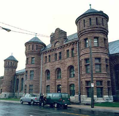 Corner view of the Halifax Drill Hall, showing the Cunard Street façade, 1990. © Department of National Defence/ Ministère de la Défence nationale, 1990.