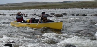 canoe in rapids