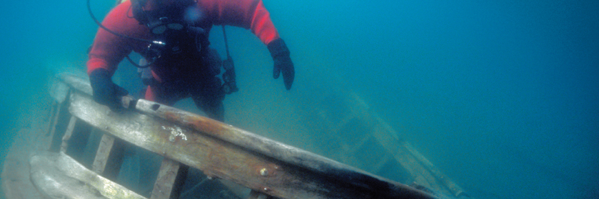 A diver above a shipwreck