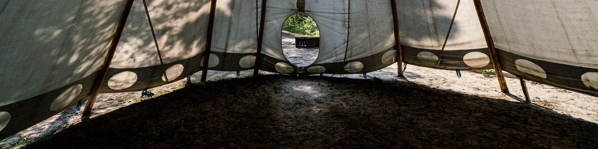 Inside an Anishinaabe camp.