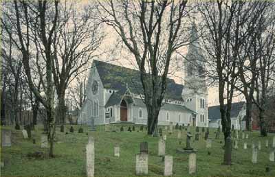General view of the Trinity Anglican Church, showing the choice of medieval architectural details, such as the pointed windows, 1991. (© Parks Canada Agency / Agence Parcs Canada, 1991.)