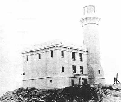 Historical image of the Triple Island Light Tower, 1921. © Parks Canada Agency / Agence Parcs Canada, 1921.