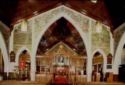 General view of St. Jude's Anglican Church, showing the decorative designs of the chancel. © Parks Canada Agency/ Agence Parcs Canada.