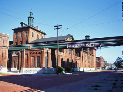 General view of Gooderham and Worts Distillery showing the existing spatial arrangement of the buildings on the site arrayed along lanes and streets. © Parks Canada Agency / Agence Parcs Canada.