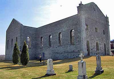 General view of the ruins of St. Raphael’s Roman Catholic Church showing the integrity of the ruin, namely the surviving layout, elevations, and interior and exterior detailing of the well-crafted cut stone walls, 2010. © D. Gordon E. Robertson, 2010