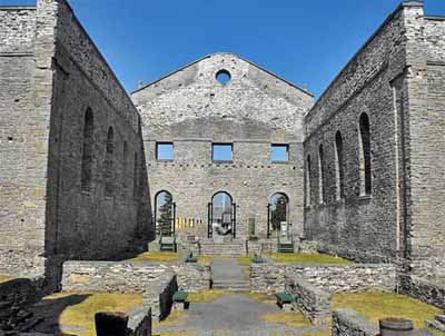 General view of the interior of the Ruin of St. Raphael's Roman Catholic Church showing the simple Palladian design with wide triangular pediment, a three-bay composition and round-headed window openings on all elevations, 2009. © Flickr, guidedbycthulhu, 2009.