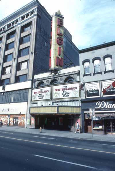 Exterior view of the Elgin and Winter Garden Theatres, showing its classically inspired, masonry and terracotta façade with an ornate marquee. © Parks Canada Agency / Agence Parcs Canada.