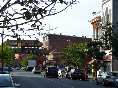General view of Victoria's Chinatown, showing one and two-storey brick tenement buildings within the inner core area, 2011. © Parks Canada Agency / Agence Parcs Canada, Andrew Waldron, 2011.