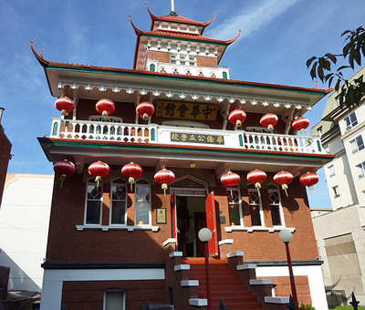 Detail view of Victoria's Chinatown, showing the occasional use of Chinoiserie motifs including upturned eaves and tiling, 2011. © Parks Canada Agency / Agence Parcs Canada, Andrew Waldron, 2011.
