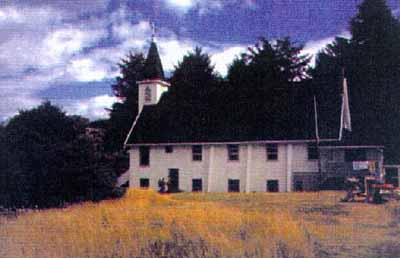 View of the church building at Yuquot. © Parks Canada/Parcs Canada, 1997