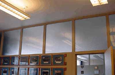 Interior view of the Radar Training Building, showing the floor to ceiling wood and glass partitioning system in the offices, which was widely used in government offices in the 1950s, 2005. © CFB Esquimalt / BFC Esquimalt, 2005.