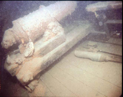Underwater image of the cannon on the Hamilton and Scourge wreck, 1982. © National Geographic, 82-1874, 1982.