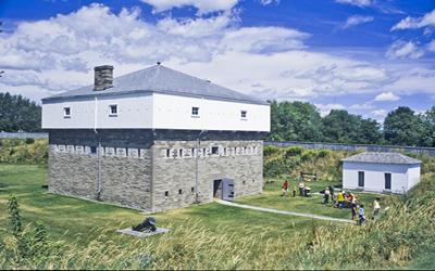 General view of Fort Wellington showing its square tower-like massing, 2006. © Parks Canada Agency / Agence Parcs Canada, Brian Morin, 2006.