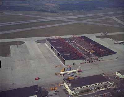 View of 10 Hangar showing its striking design and location along the main runway, 1970. © Department of National Defence / Ministère de la Défense nationale, 1970.
