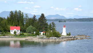 General view of Dryad Point Lighthouse and related buildings, 2010. (© Kraig Anderson - lighthousefriends.com)