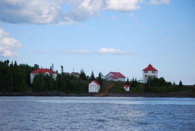 General view showing the seven related buildings on the site that contribute to the heritage character of Lamb Island Lighthouse. © Jim Bailey