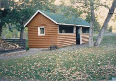 General view of Kitchen Shelter 9, showing the four-foot high walls, 1990. (© Parks Canada Agency / Agence Parcs Canada, 1990.)