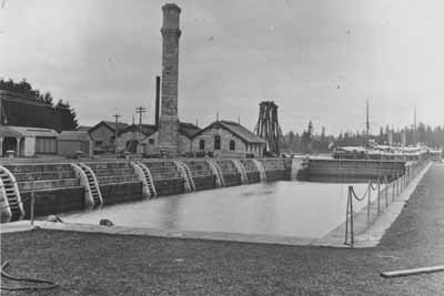 Exterior view of Dry Dock Pumphouse, Building D175, showing the building's form and massing. (© (BCARS, HP352))