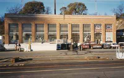 General view of the Pump House, showing its large vertical steel-framed windows divided into small panes, 1991. © Department of Public Works / Ministère des Travaux publics, 1991.