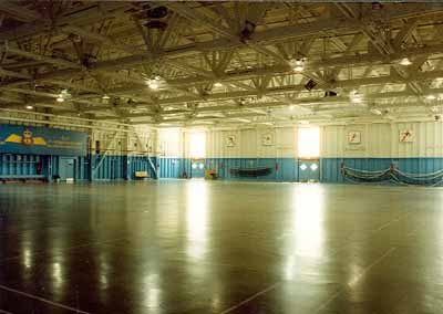 Interior view of Building 21, showing its large, open, central space, 1996. © Parks Canada Agency / Agence Parcs Canada, 1996.