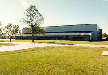 Side elevation of Building 21, showing its large scale and specialized military design, 1996. © Parks Canada Agency / Agence Parcs Canada, 1996.