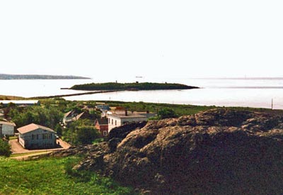 General view of Partridge Island Quarantine Station, showing the isolated location of Partridge Island at the mouth of Saint John Harbour. © Parks Canada Agency / Agence Parcs Canada, 2003.