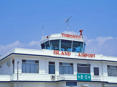 General view of Toronto Island Airport Terminal Building showing its central projecting control tower, including its placement and massing. © Parks Canada Agency / Agence Parcs Canada.