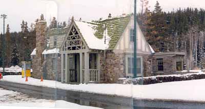 Façade of Building 3, showing the half-timbering featured on the upper half of the building and the use of locally quarried split fieldstone in irregular courses for the exterior walls, 1985. © Parks Canada | Parcs Canada, 1985.