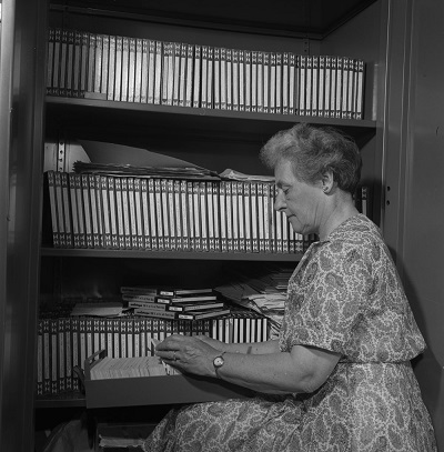 In the Public Archives of Nova Scotia, Dr. Creighton checks some of the 400 odd tapes deposited there. Originals are lodged in Canada's National Museum in Ottawa. Thanks to her tireless efforts, a colourful part of Canada's storied past has been preserved © Bibliothèque et Archives Canada | Library and Archives Canada/Fonds de l'Office National du Film | National Film Board fonds/e011177104