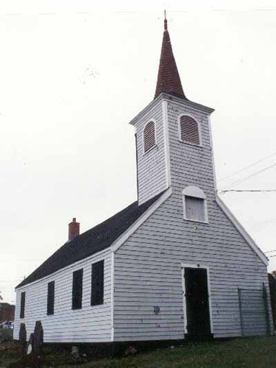 General view of Little Dutch (Deutsch) Church, showing its small scale, rectangular massing, pitched roof and belfry with polygonal spire, 1995. © Parks Canada Agency / Agence Parcs Canada, 1995.