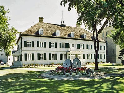 General view of Grey Nuns' Convent, showing its symmetrical composition with evenly spaced paired and shuttered casement windows, 1986. © Parks Canada Agency/ Agence Parcs Canada, 1986.