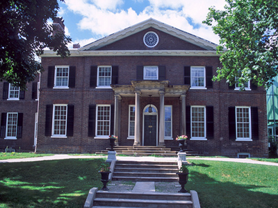 General view of The Grange showing its rectangular, two-storey massing. © Parks Canada | Parcs Canada.