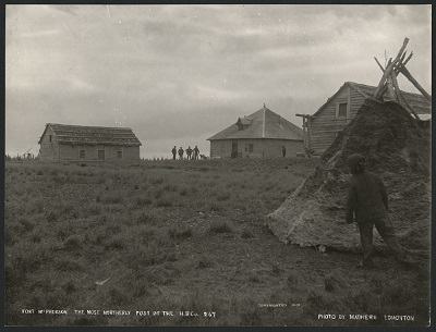 Historic photograph showing the Hudson's Bay Company Posts at Fort McPherson, ca. 1901, from which only remains are left today. © C.W. Mathers / Library and Archives Canada | Bibliothèque et Archives Canada / Robert Bell fonds / e011368933