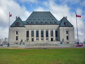 Front facade of the Supreme Court Building showing the carefully proportioned, symmetrical design which is enhanced by the use of elegant materials to create a dignified sense of occasion and presence, 2011. © Parks Canada | Parcs Canada, M. Therrien, 2011.