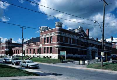 Corner view of Peterborough Drill Hall / Armoury National Historic Site of Canada, 1980. © Parks Canada Agency / Agence Parcs Canada, 1980.