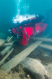 Diver at rear of wreck of HMS Erebus