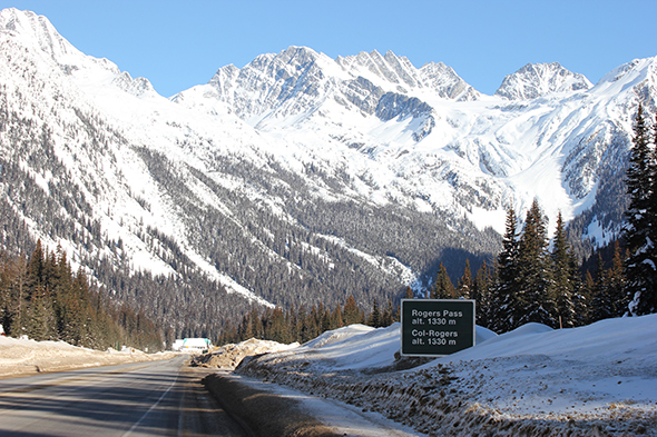 Trans-Canada Highway. Road sign reads “Rogers Pass altitude 1,330 m.”